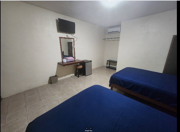 Habitación con dos camas